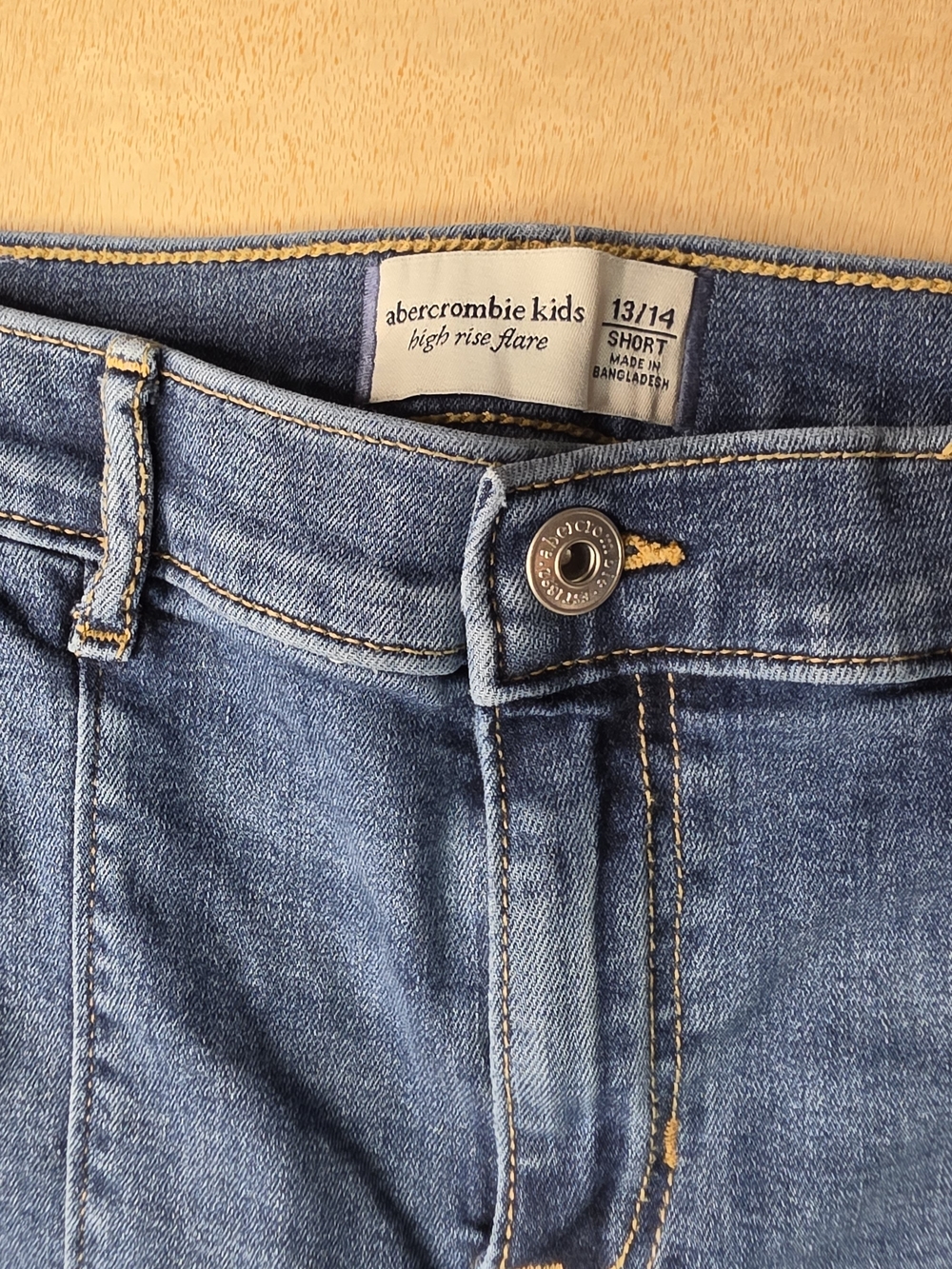 abercrombie kids blue high-rise flare jeans with gold stitching